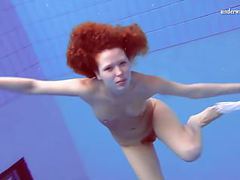 NymphoClips presents: Matrosova hot ginger pussy in the pool