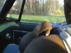 NymphoClips presents: Black bbw with big tits sucking dick in a car.