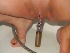 NymphoClips presents: Pierced nipples and pussy mature slave in bdsm action