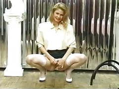 NymphoClips presents: Blonde spreads her legs to show off her pussy and ass