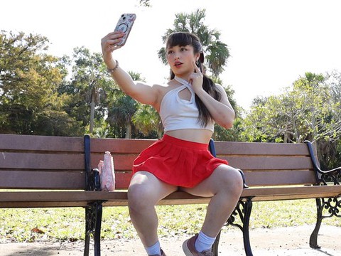 NymphoClips presents: Gorgeous solo college babe doing striptease in a park - pixie