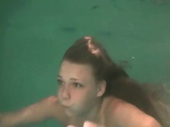 NymphoClips presents: Neatly trimmed pubic hair on teen in pool