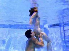 NymphoClips presents: Cute girl sucks cock in the pool