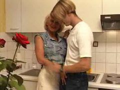 NymphoClips presents: Fucking his busty aunt in the kitchen