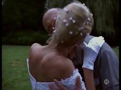 NymphoClips presents: Naughty bride taken outdoors by two guys