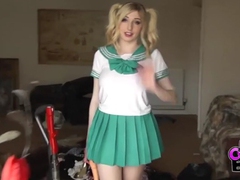 NymphoClips presents: Costume babe in a miniskirt fucks a toy outdoors