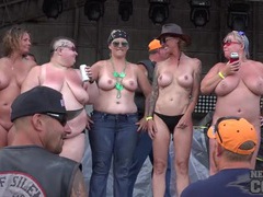 NymphoClips presents: Biker babes topless on stage dancing for the guys