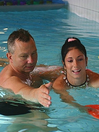 NymphoClips presents: Brunette teenage beauty fucked by a horny swim teaching paps