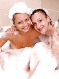 NymphoClips presents: Naughty sexy young chicks taking a hot bubble bath together