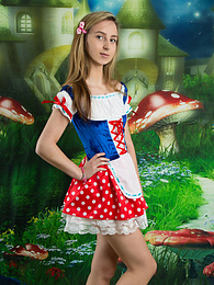 NymphoClips presents: Very hot blonde teen beauty in an adorable outfit slowly takes it off to reveal her nice and perky boobs