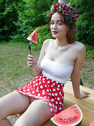 NymphoClips presents: Nice belarusian stunner Rokki removes all clothes on a blanket in a backyard