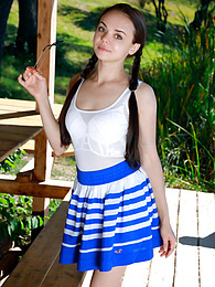 NymphoClips presents: Fresh-Faced russian beauty Mia Grandy gets totally naked on a picnic table in a garden